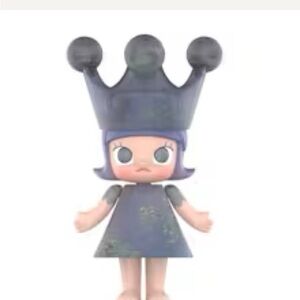 Whimsical Blue and Purple Doll with Crown